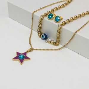 Conjunto acero inoxidable estrella purpura piedra blanca