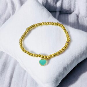 Pulsera dorada bolas acero inoxidable corazon verde