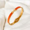 Brazalete dorado acero inoxidable naranja