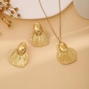 Conjunto dorado acero inoxidable concha