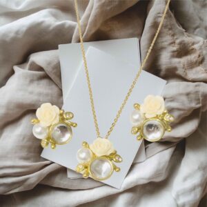 Conjunto dorado acero inoxidable flor