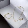 Set collar, pulsera y aretes dorado acero inoxidable lazo