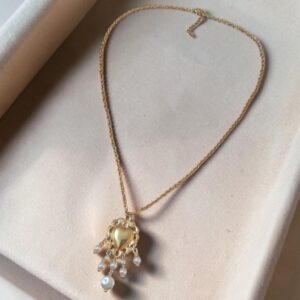 Collar dorado acero inoxidable borla