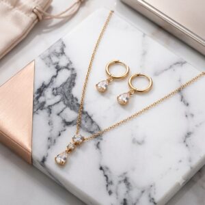 Conjunto dorado acero inoxidable gotas