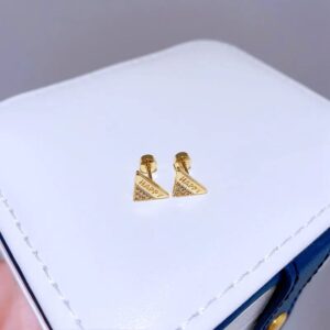 aretes dorado acero triangular