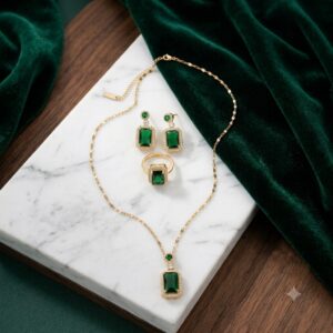 conjunto dorado acero inoxidable cuadrado piedra verde